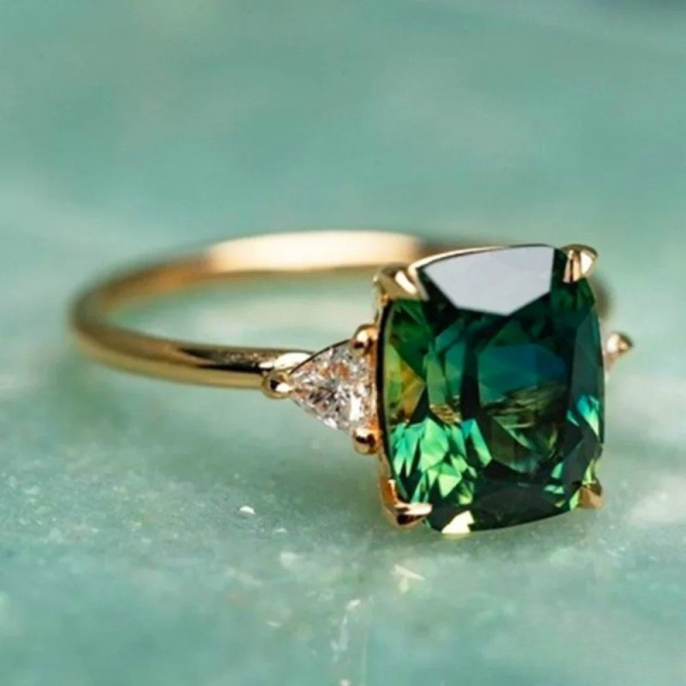 Gold ring with green zirconia