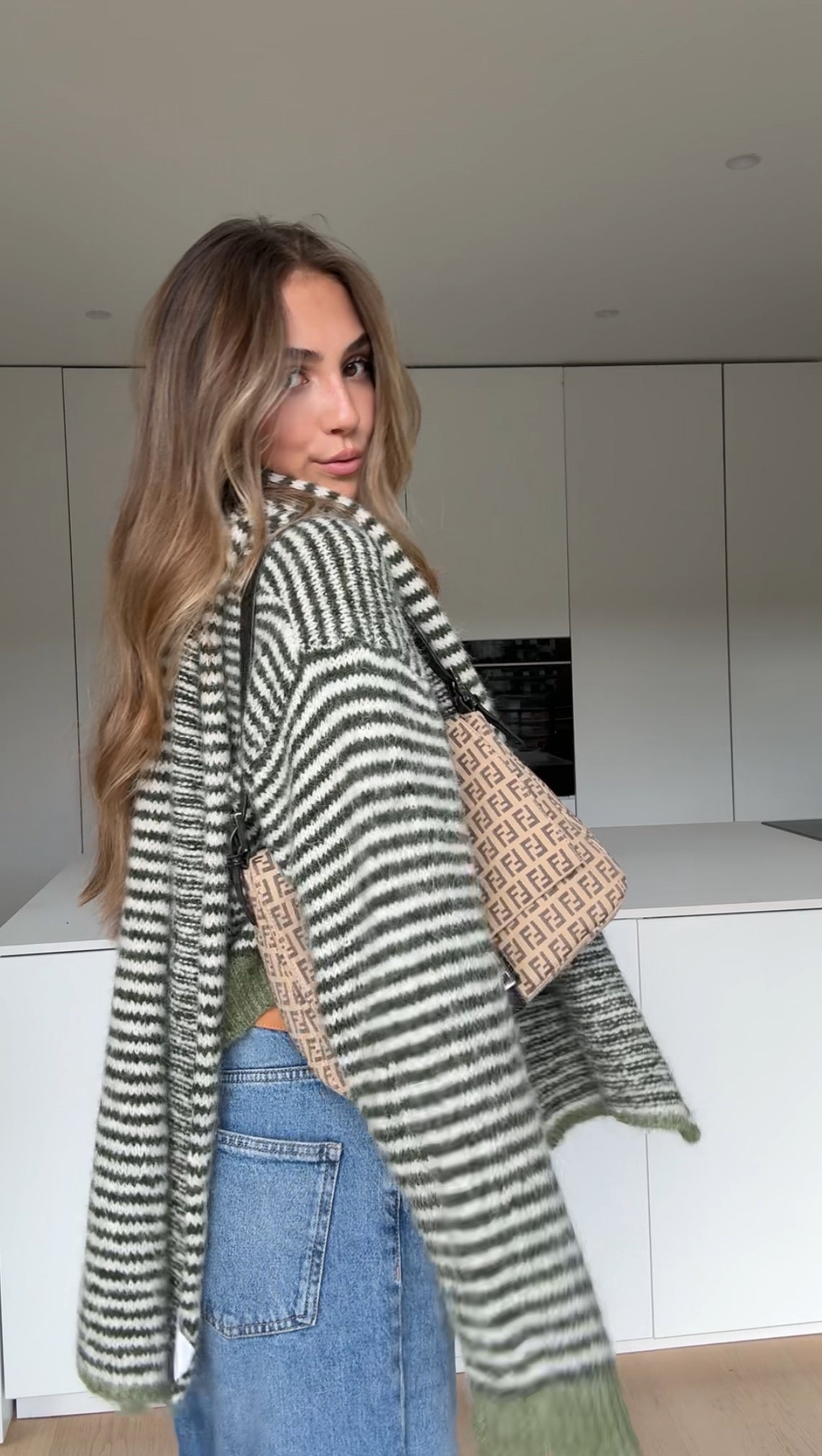 Soft striped cardigan in a muted color