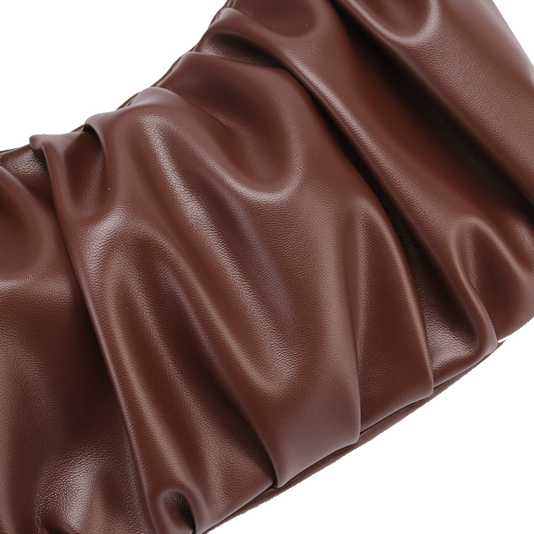 Chara | Croissant-shaped leather sling bag