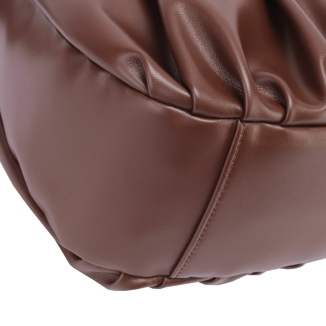 Chara | Croissant-shaped leather sling bag